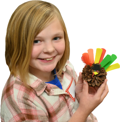 Girl with turkey craft