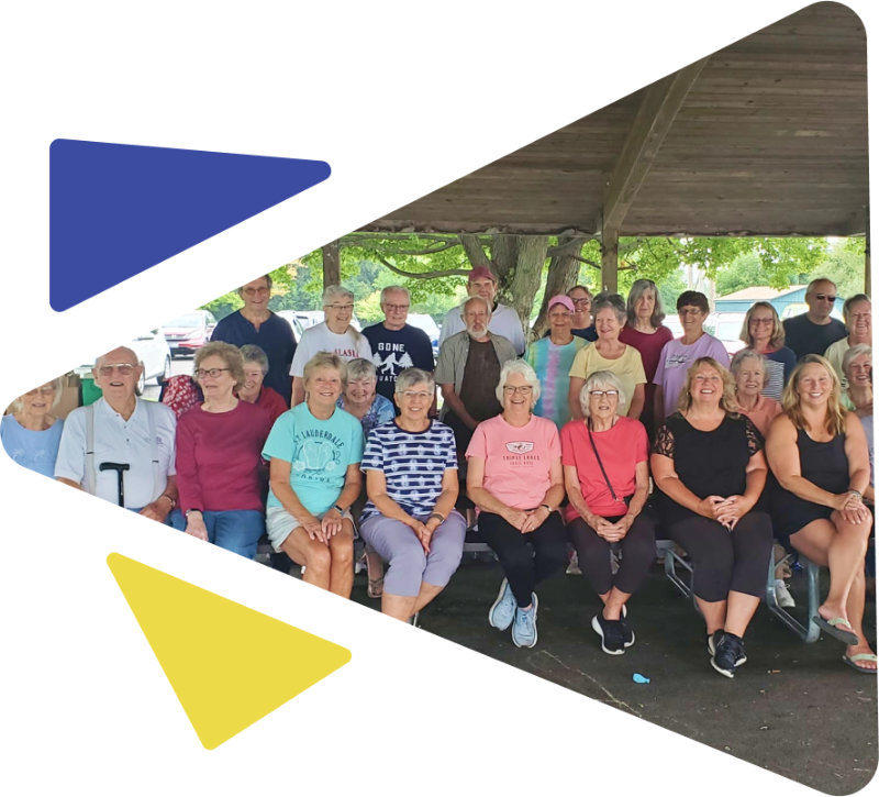 Group at pavilion, smiling